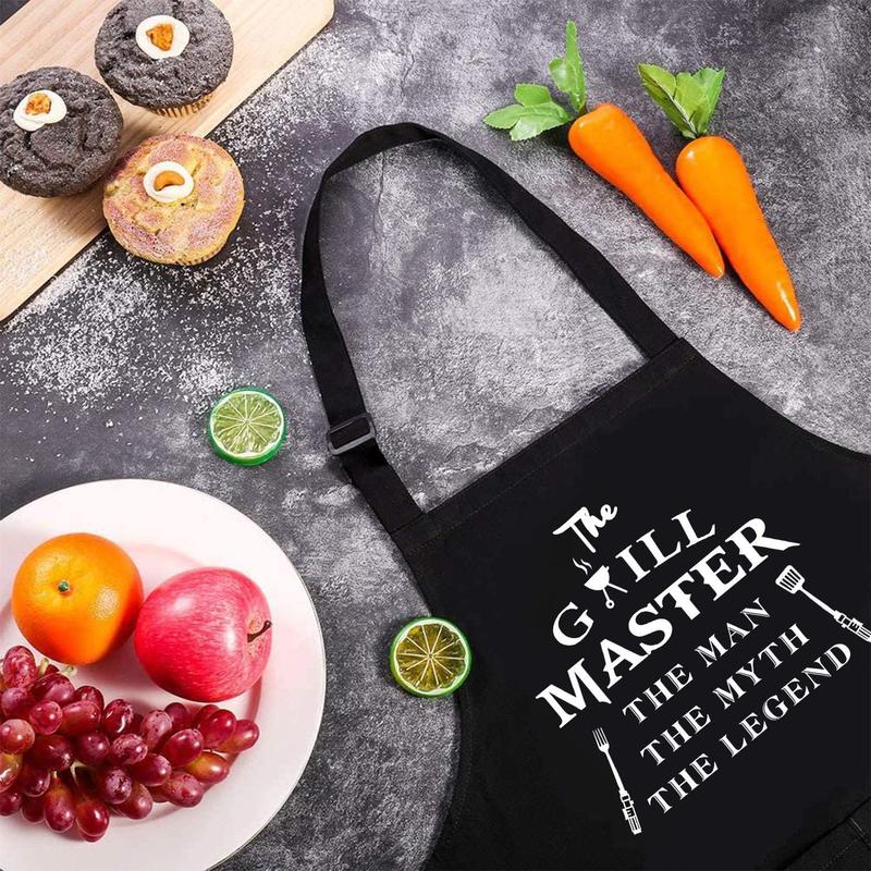 Funny Aprons for Men - The Grill Master, The Man The Myth The Legend - Cooking Grilling BBQ Chef Apron for a Husband, Dad Gifts,  Oil Proof Black Apron with 2 Pockets